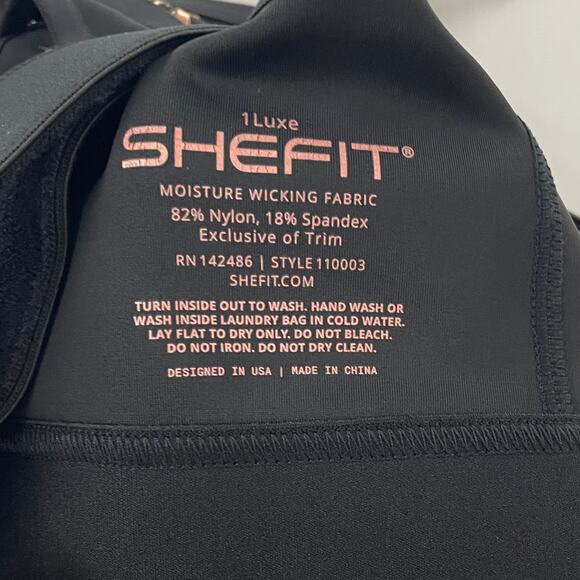 SHEFIT 1Luxe Flex Sports Bra Black Gold Medium Impact Front Zip - Picture 6 of 7